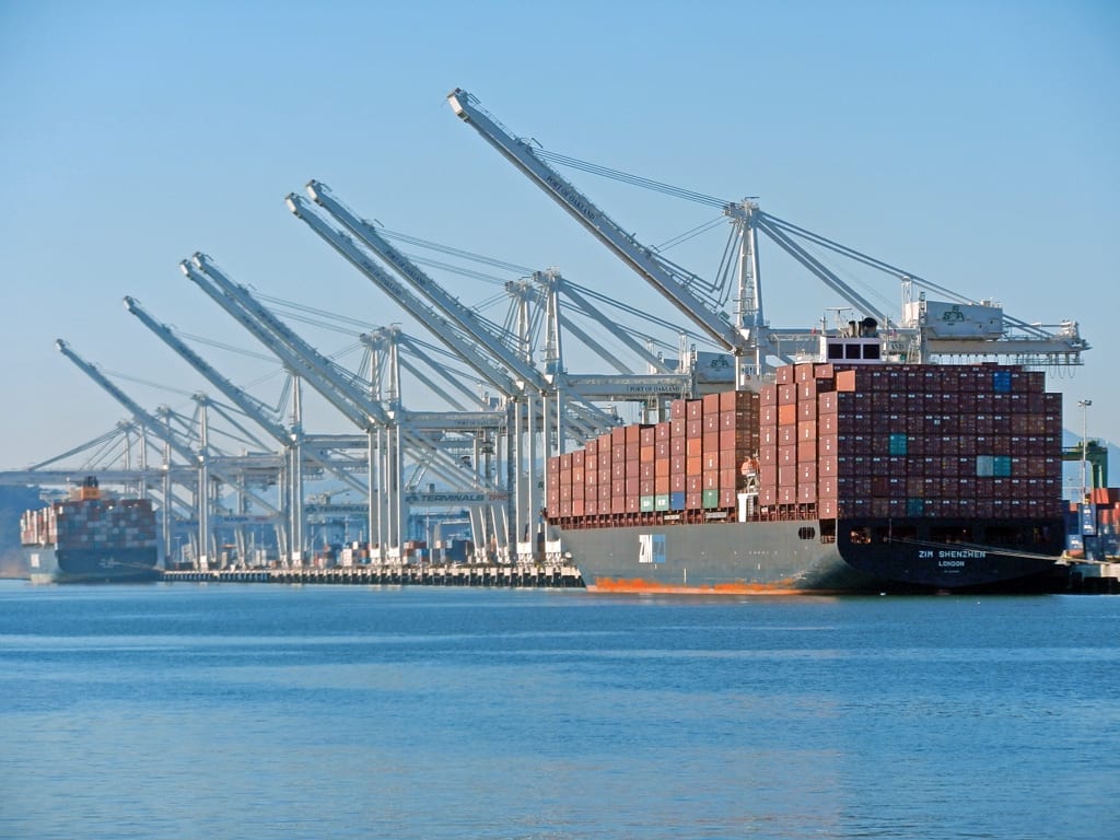 Container ships line up to be unloaded by the large cranes at the Oakland Port.