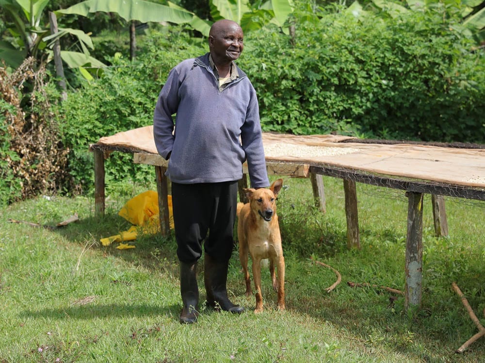 Allison and his dog, also named Tom. Benson karauki gachoko is owner of this Shamba.