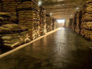 Stacks of palletized coffee bags inside the warehouse of Continental Terminals Annex in Alameda, California.