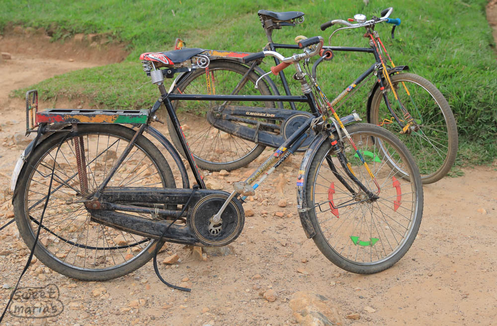 The bikes in Rwanda are modified including solid steel racks (made with a lot of rebar - heavy!) and front fork supports. This is to save the frame from breaking under the heavy loads, often 150 lbs of coffee or banana.