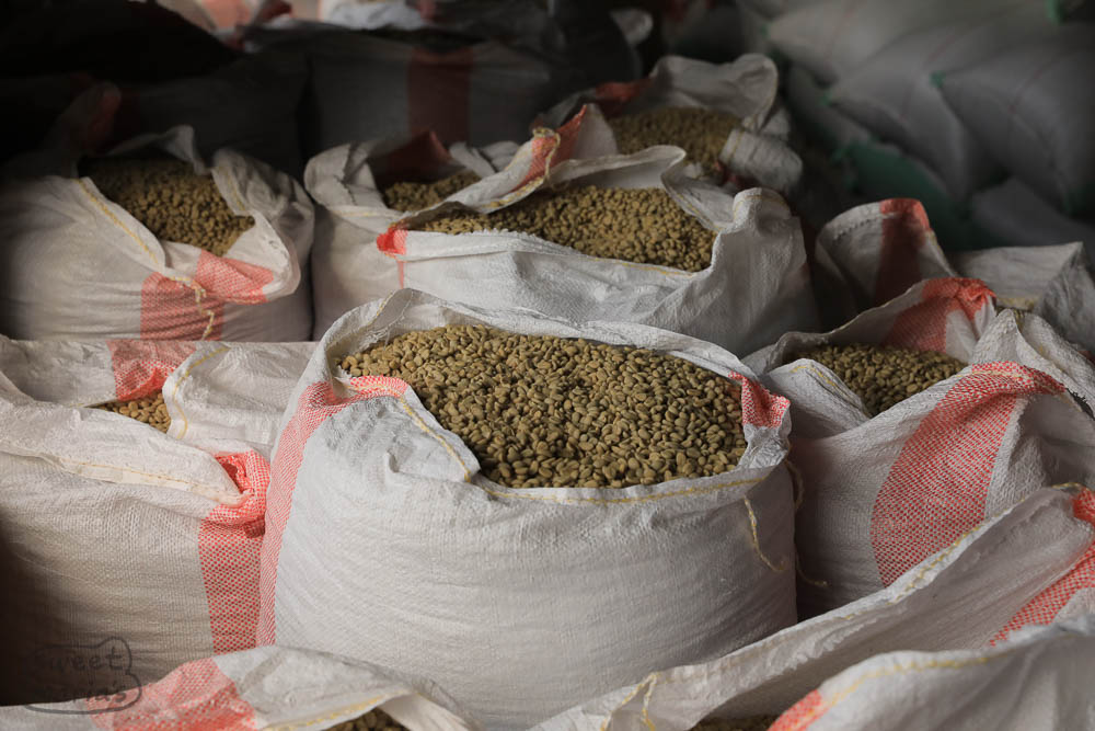 After coffee comes in from the drying beds at 11% moisture, it is often rested for some time indoors before sending it to Kigali. It could just be logistics of transport, but it also is good for the stability of the coffee in terms of moisture and water activity.