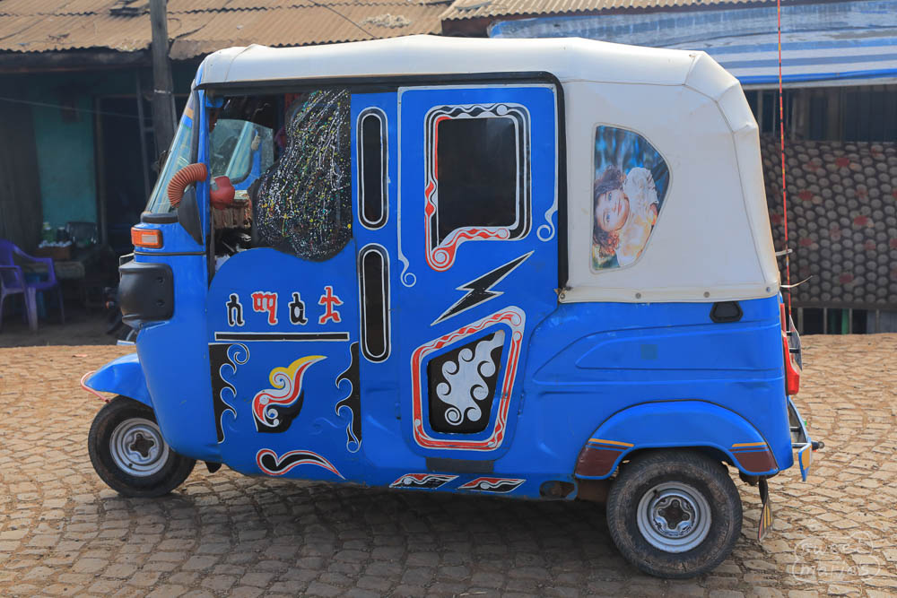 This is a Bajaj and they have tons of style. Bajaj are one of the most fashionable ways to get around, and people put a lot of work to make them stand out and have character.
